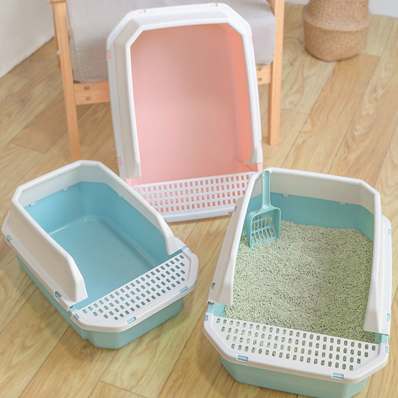 What are the key features that make a cat litter box suitable for wholesale distribution